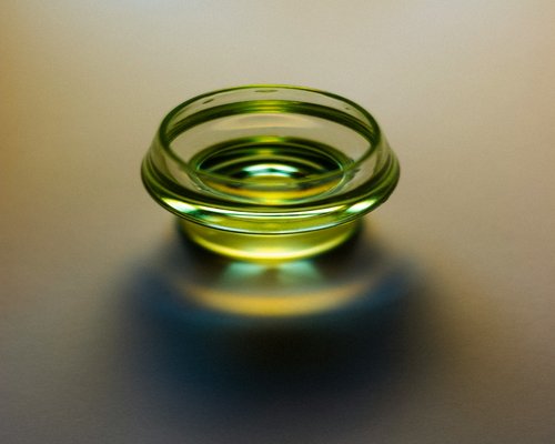 extra virgin olive oil in glass bottle